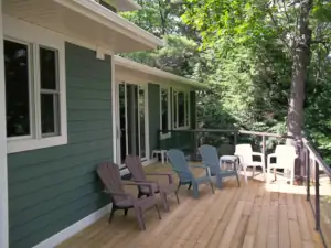 The sun deck connects via large double sliding patio doors to the Dining Room and the Muskoka Room.