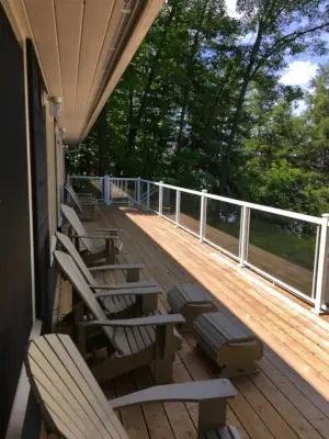 The roof overhang provides shad for Muskoka chairs during late afernoon in Summer.