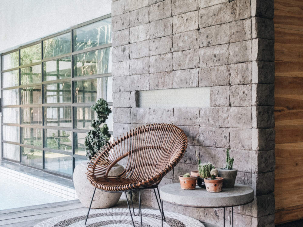 Bright daylight due to large glass areas is characteristic in the interior of modern home designs.